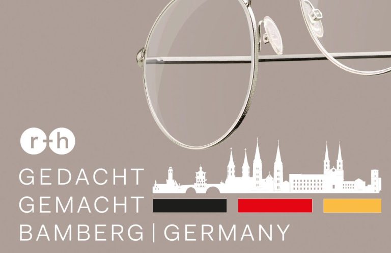 Brille mit Schriftzug "Gedacht gemacht Bamberg Germany" und Silhouette der Stadt.